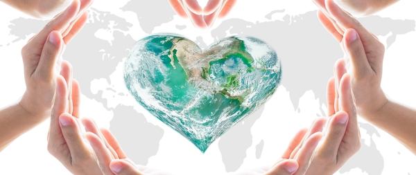 Hands enveloping a heart for Environmental protection